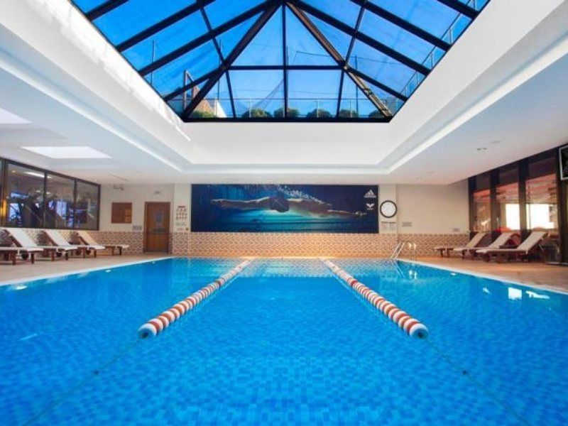 Hilton Izmir Hotel Exterior photo The swimming pool at the hotel